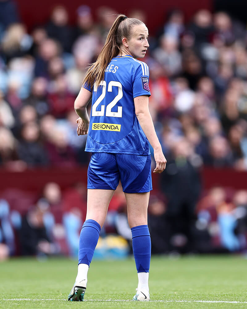 Image showing a player in action showcasing the WSL font and badge