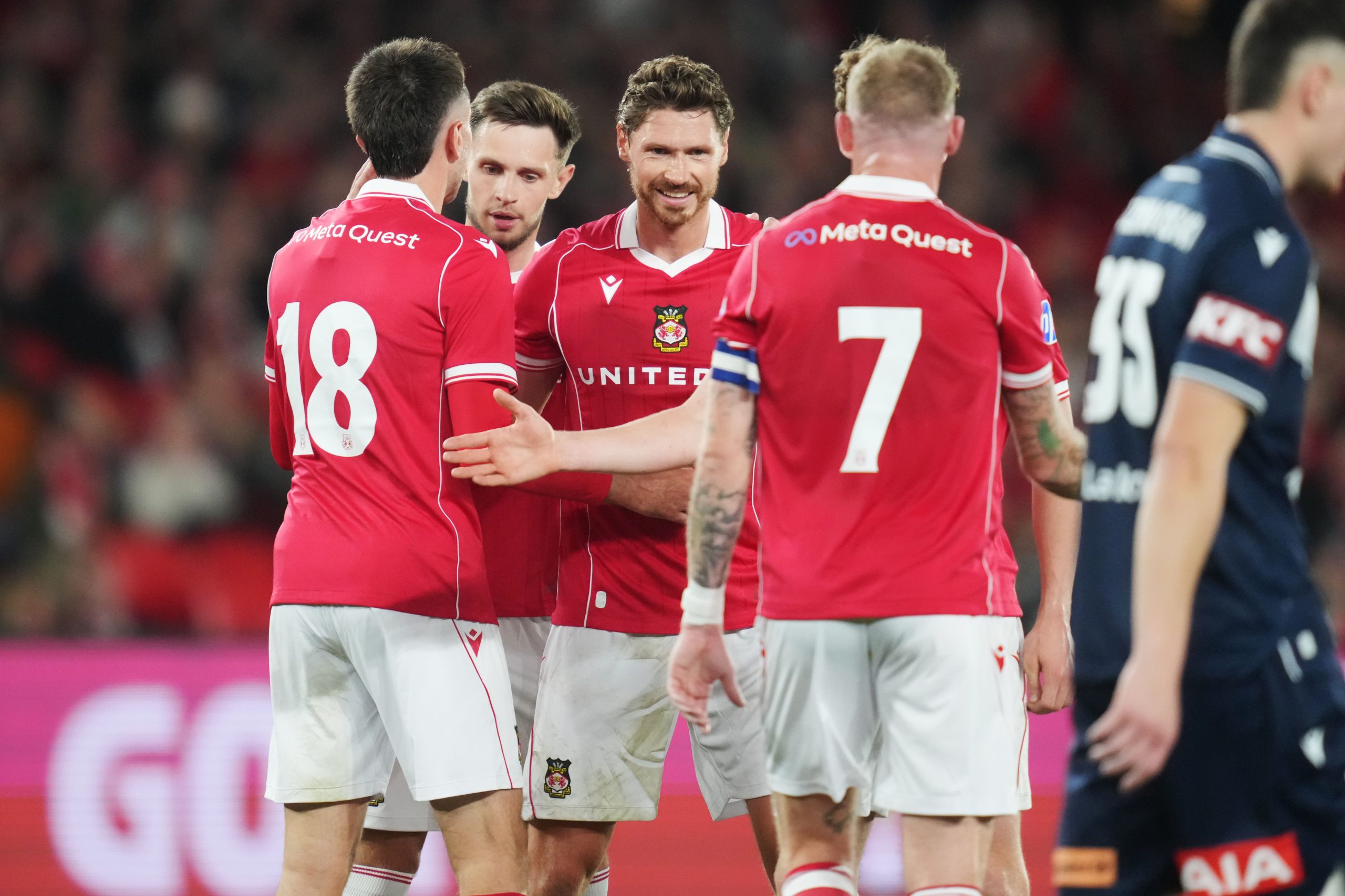 Image showing Wrexham players celebrating with numbers manufactured by Elms
