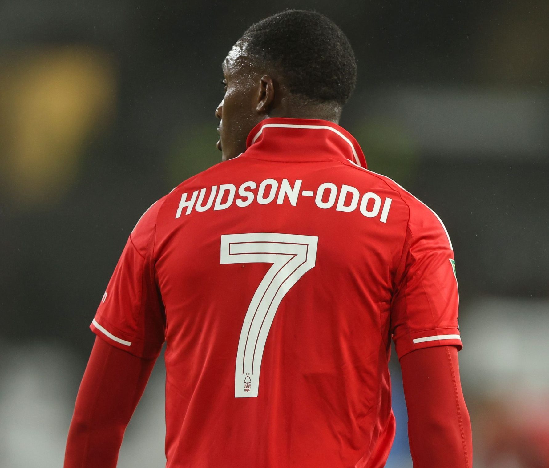 A Nottingham Forest player wears an ID UNLIMITED made font